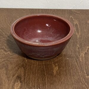 HAND CRAFTED SMALL POTTERY BURGUNDY BOWL SIGNED 5-1/4" DIA.